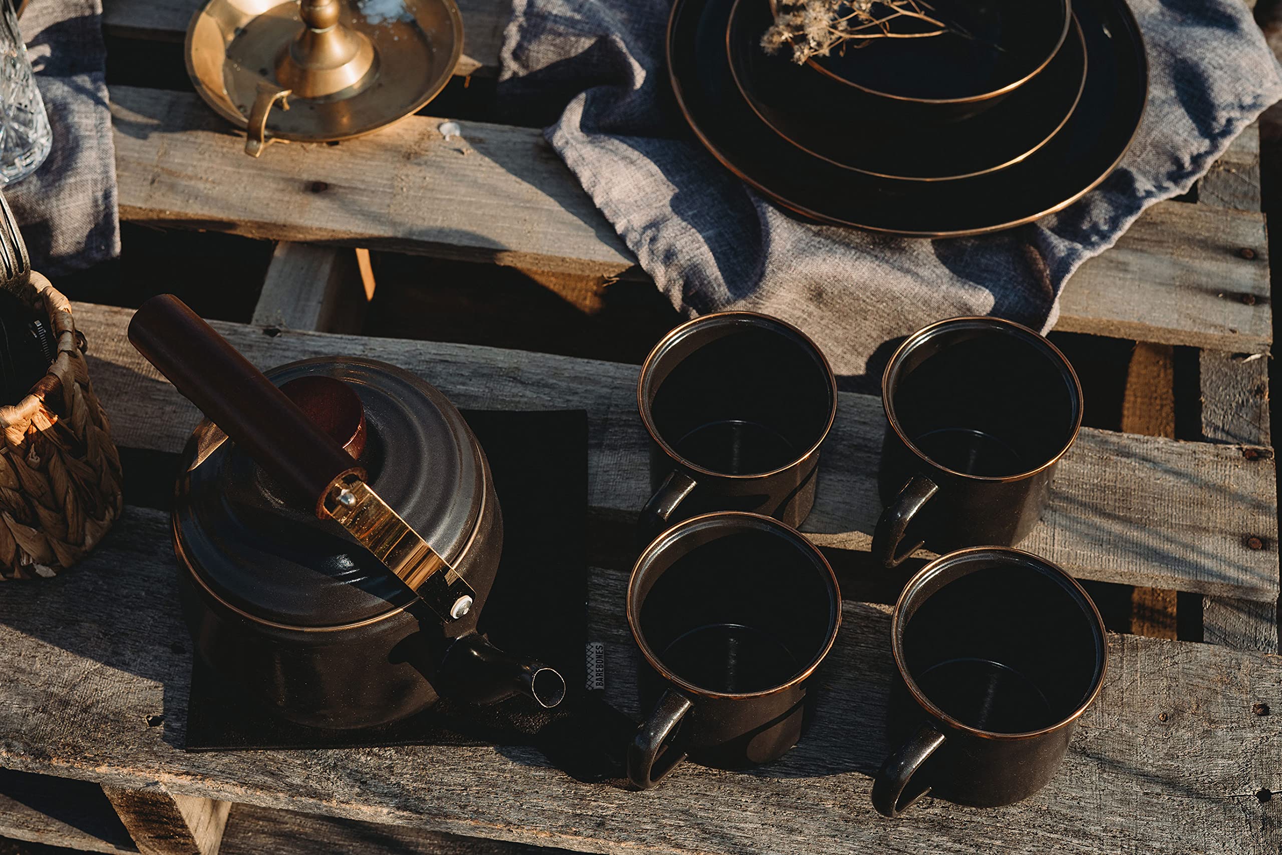 Barebones enamel cup used camping demonstrates versatile mug for drinks and soups.
