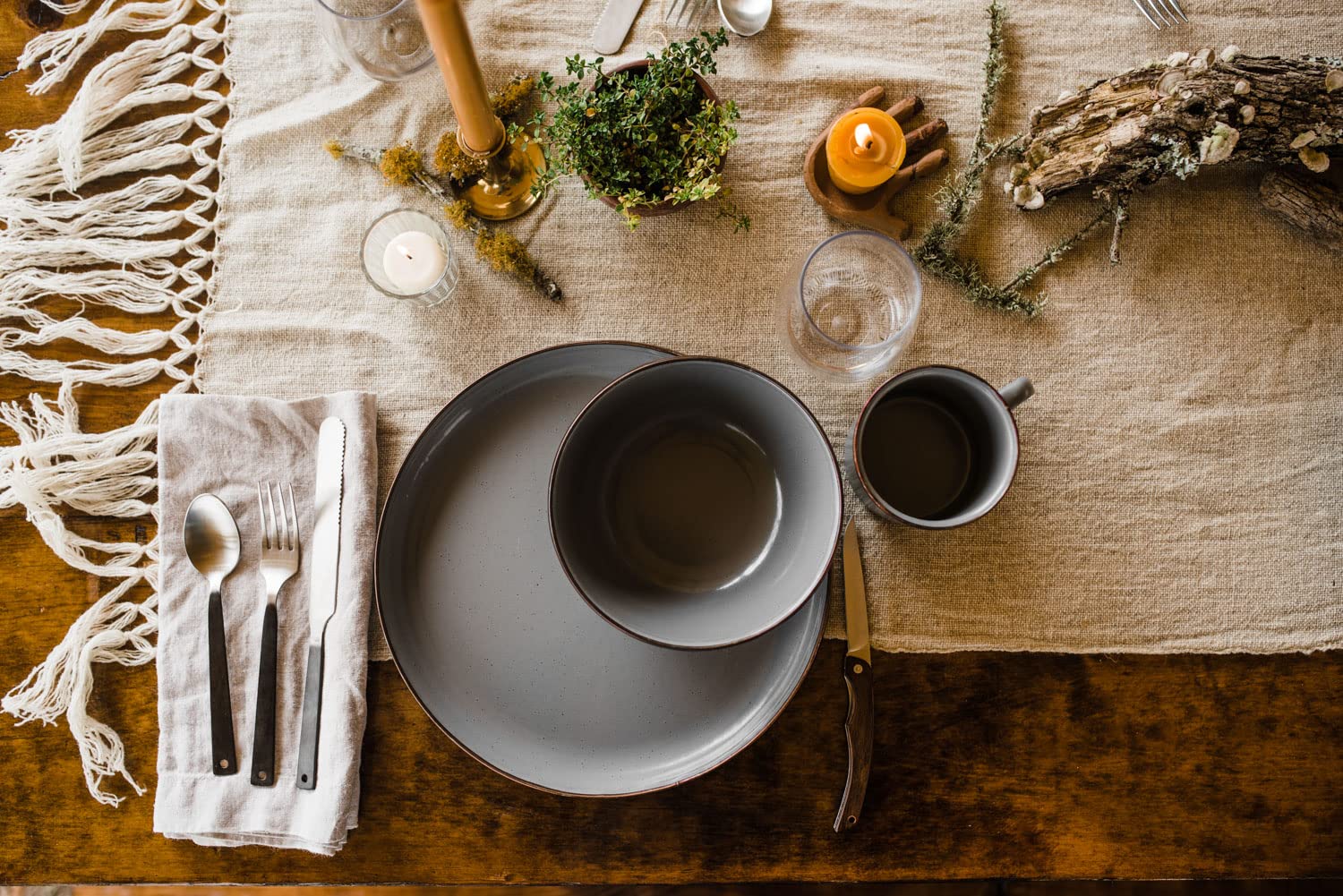 Barebones cohesive dinnerware look unifies your table setting with rustic charm.