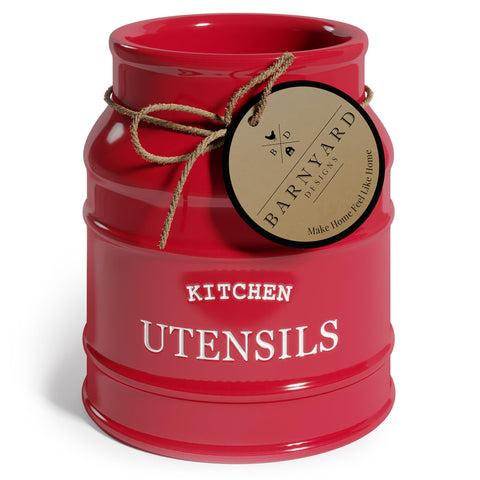 Barnyard Designs ceramic farmhouse utensil holder on counter keeps utensils organized.