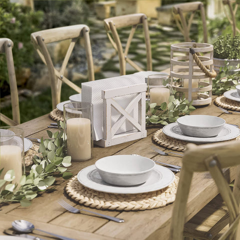 Barnyard Designs white distressed napkin holder on table for farmhouse style
