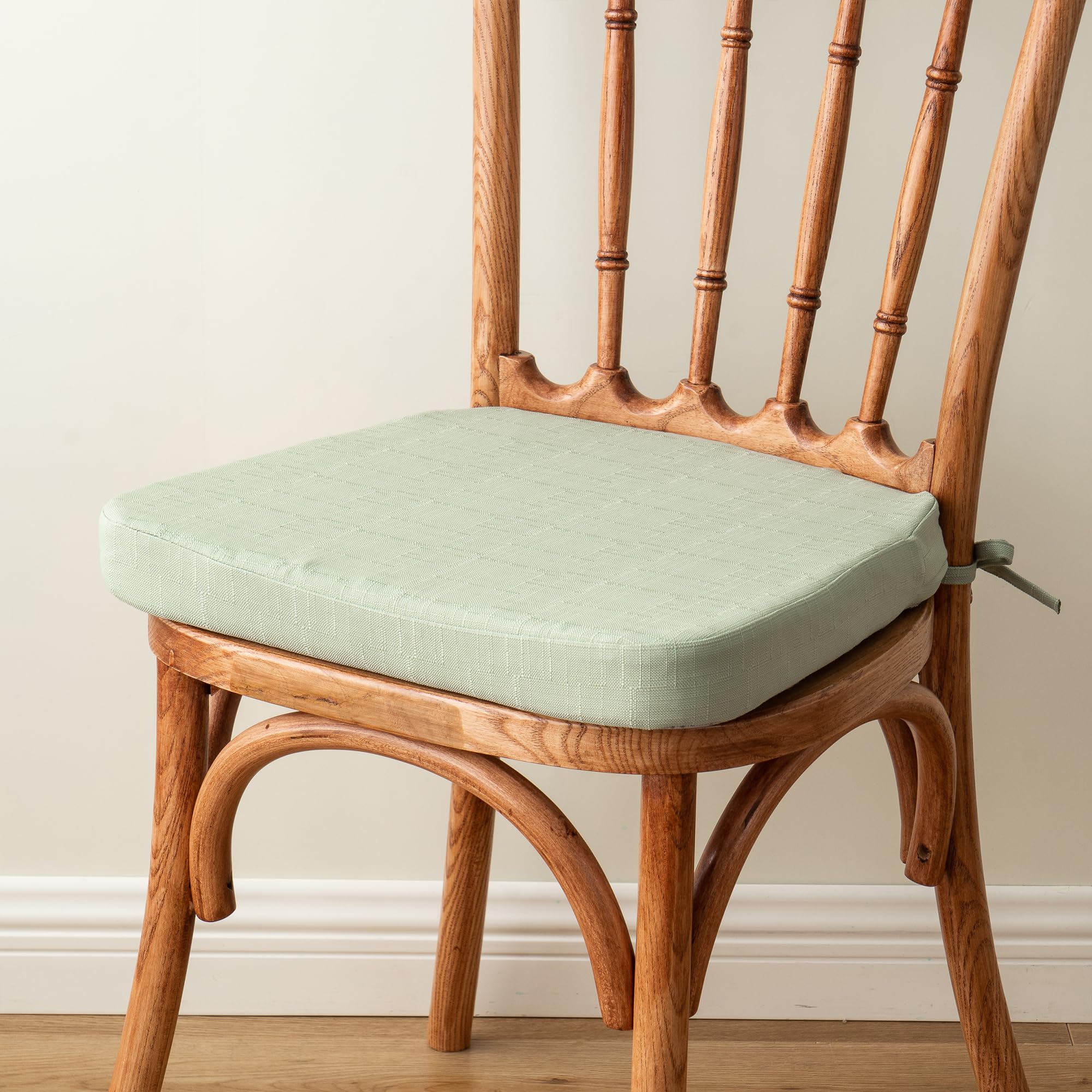 Battilo Home sage green set of 2 cushions complements many chairs.