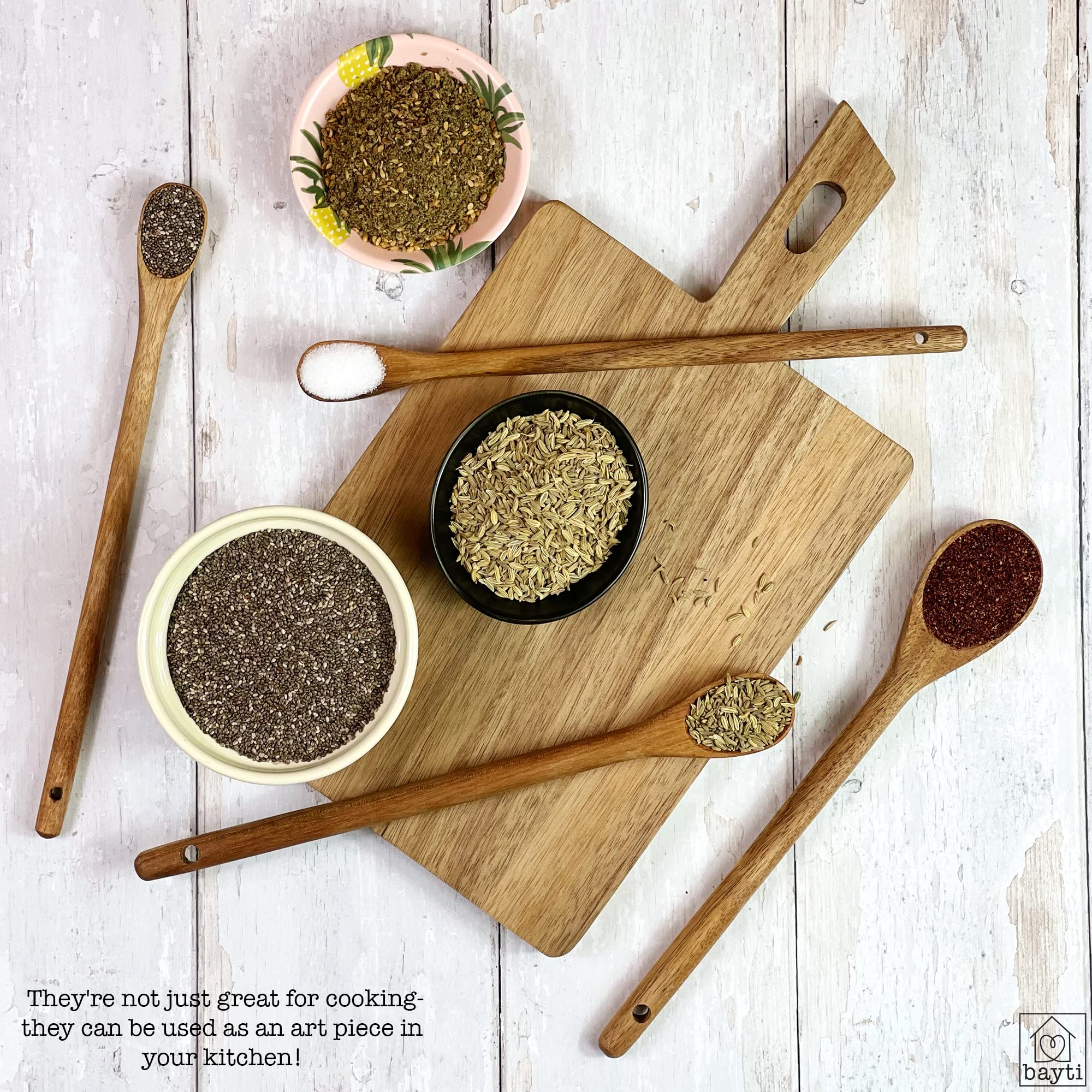 Bayti acacia wood spoons close-up highlights natural grain and durable finish.