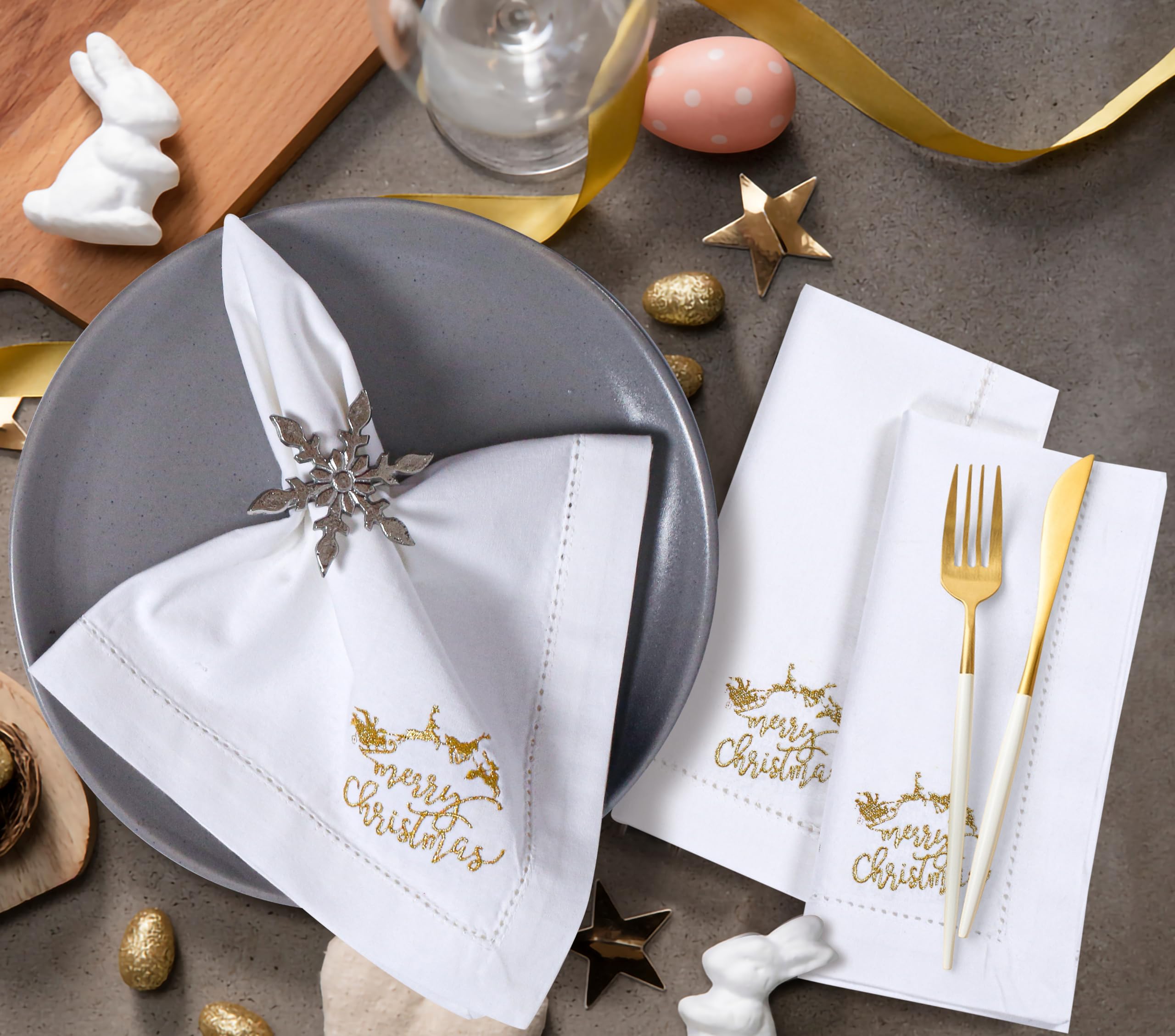 Bedding Craft set of 12 white napkins with gold embroidery for formal dining.