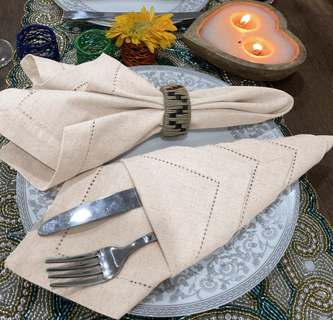 Bedding Craft napkins with hemstitched corners add refined detail.