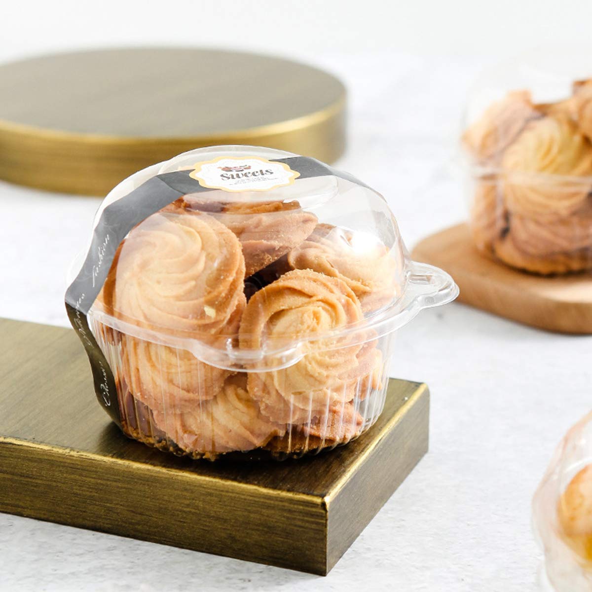 Bekith domed-lid-icing-protection guards delicate decorations during transit.