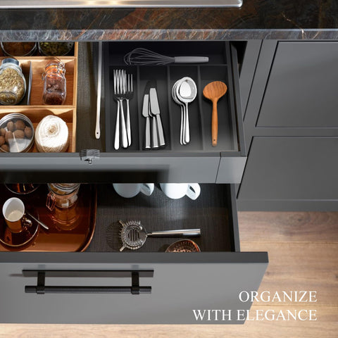 BEKVEM bamboo organizer with grooved dividers keeps utensils separated and stable.