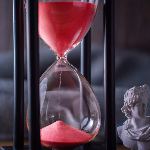 BELLAWARE wooden frame hourglass in use during study or cooking tasks.