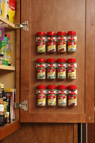 Bellemain spice gripper clip mounted on cabinet for easy access.