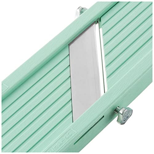 Benriner Vegetable Slicer Green in-use carrot dicing demonstrates efficient prep.