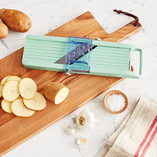 Benriner Vegetable Slicer Green storage view suggests compact storage after use.