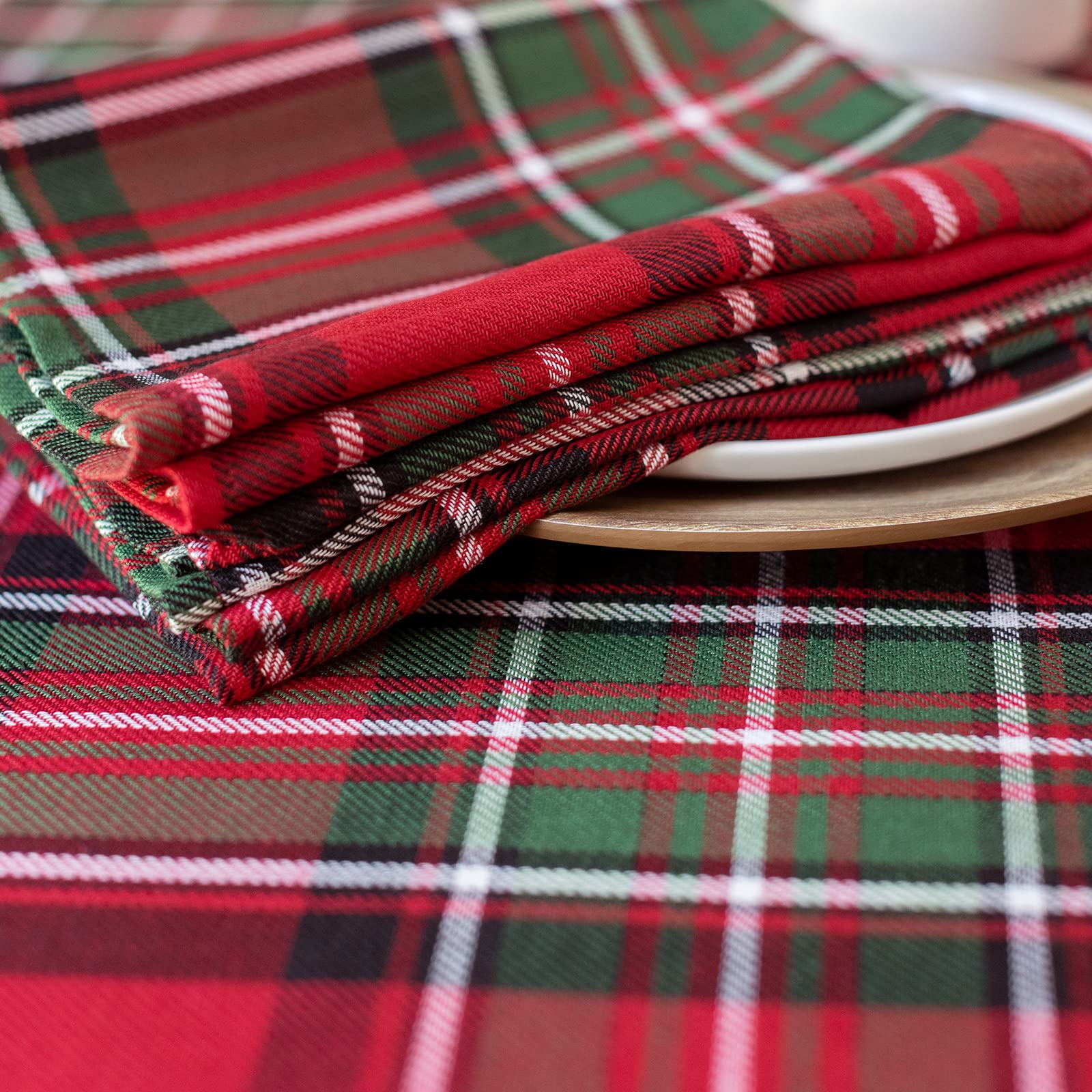 Napkins laid out on a winter table with Benson Mills plaid design