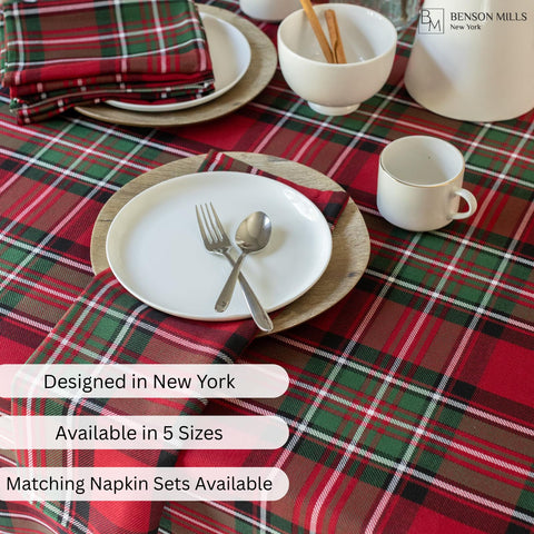 Benson Mills holiday plaid tablecloth on a warmly set dining table
