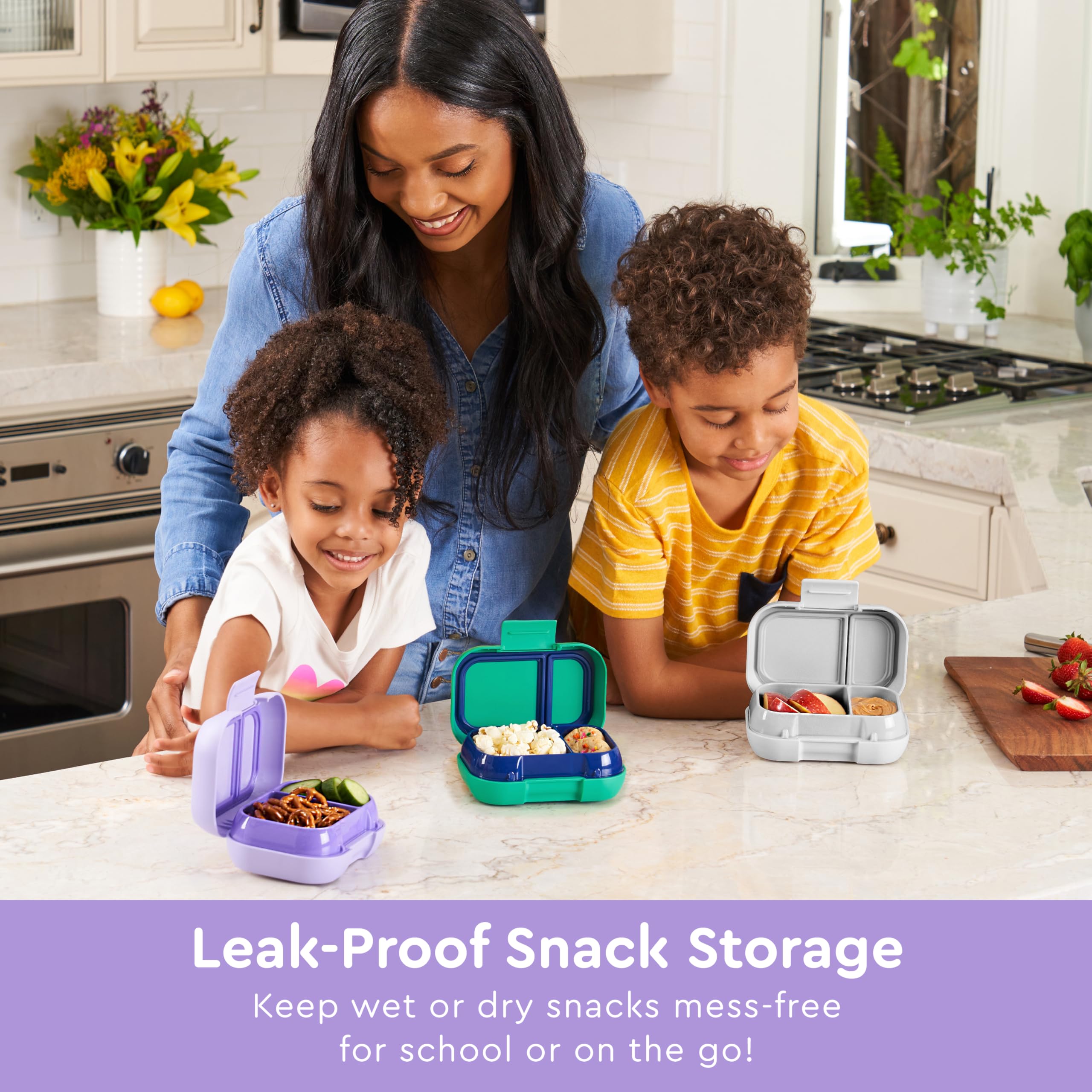 Easy-open latch helps little hands use Bentgo Kids Snack confidently during snack time