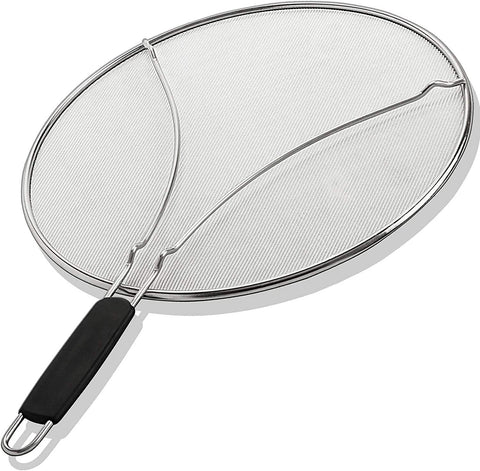 BergKoch splatter screen on pan shielding hands from hot oil splatter