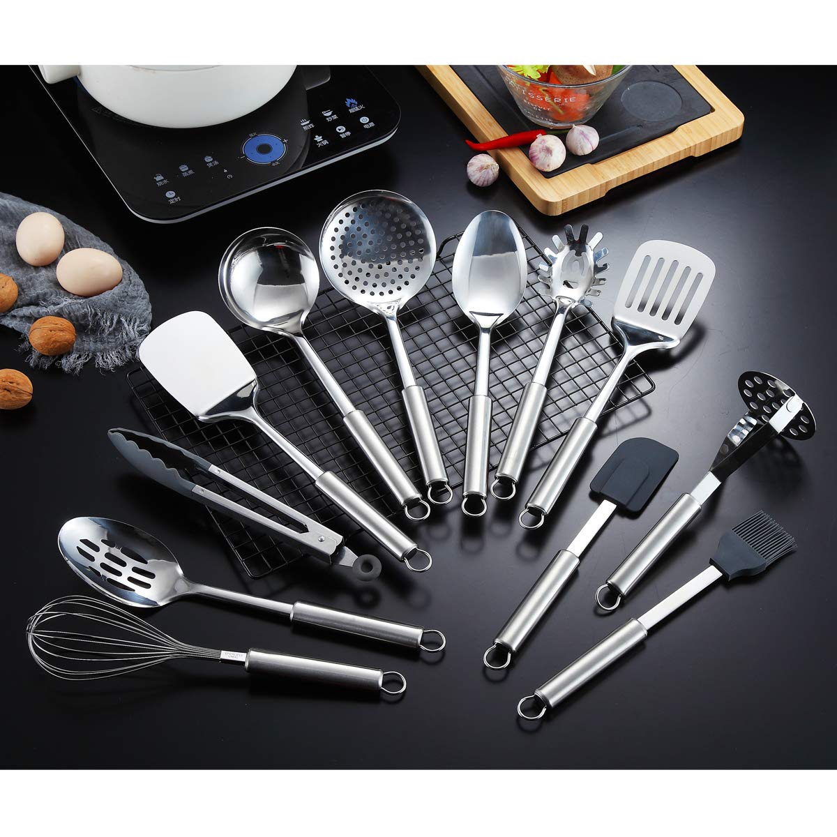 Berglander 12-piece utensil set slotted turner for flipping and draining foods.