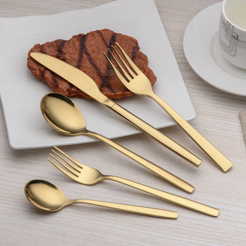 Berglander gold flatware dinner forks close-up, elegant shine for entertaining
