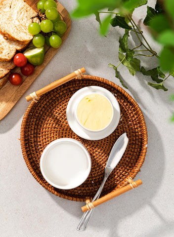 White porcelain butter keeper base with waterline seals air for easy spreading.