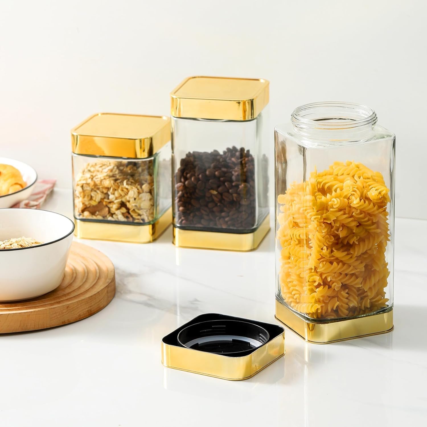 BETTWILL clear glass with gold tone lid adds style to cabinets.
