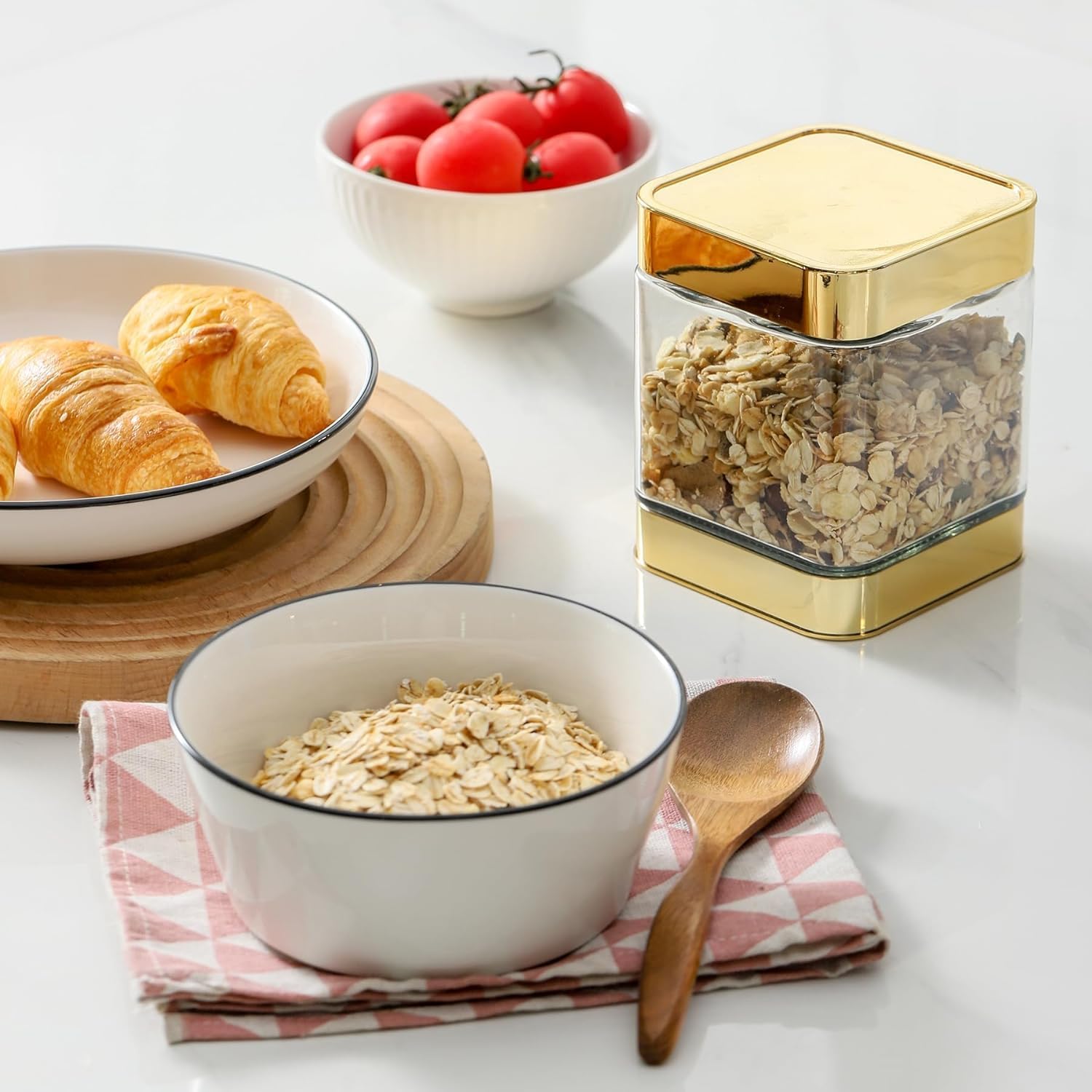 BETTWILL 48 oz glass canister with airtight lid ideal for cereals and snacks.