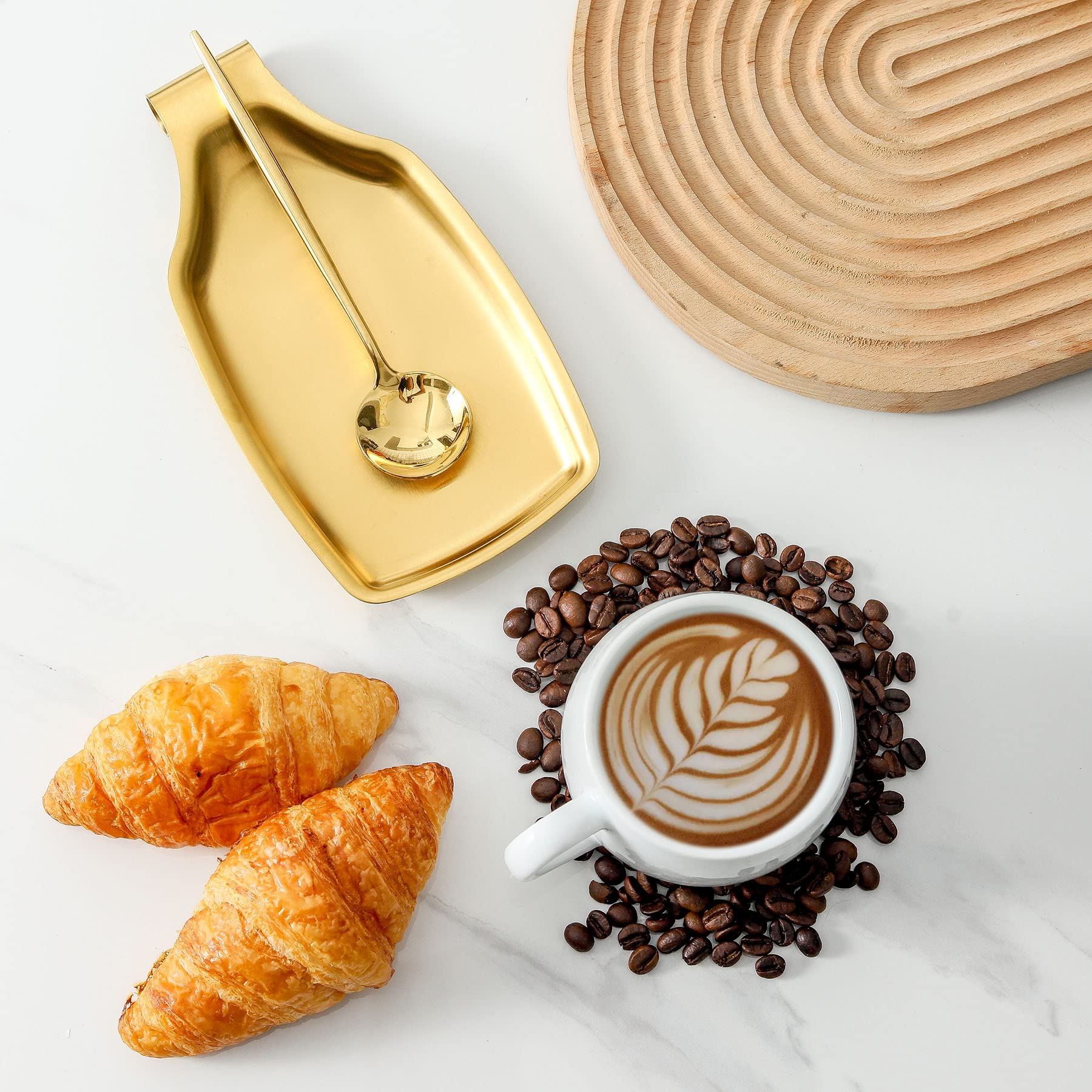 BETTWILL gold spoon rest with easy-hook for hanging display.