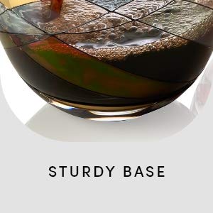 Elegant Bezrat wine glasses with a comfortable hand-held shape for easy pouring.