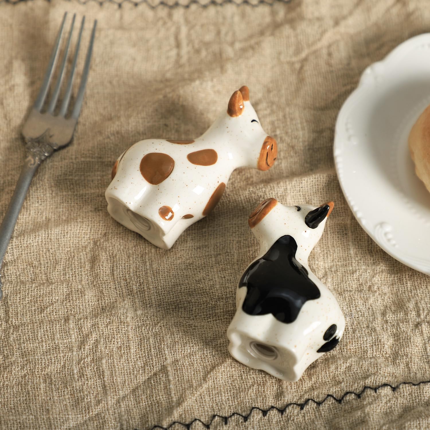 Bicuzat brown ceramic salt and pepper shakers, durable and stylish.