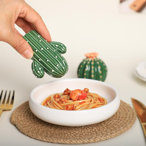 Bicuzat cactus shakers on a dining table as a decorative and functional piece