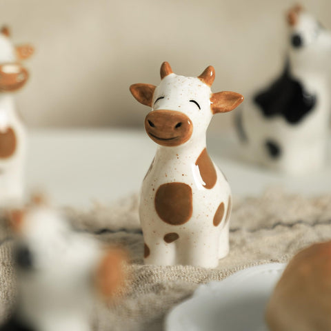 Bicuzat handmade style cow salt pepper shakers for playful table accents.