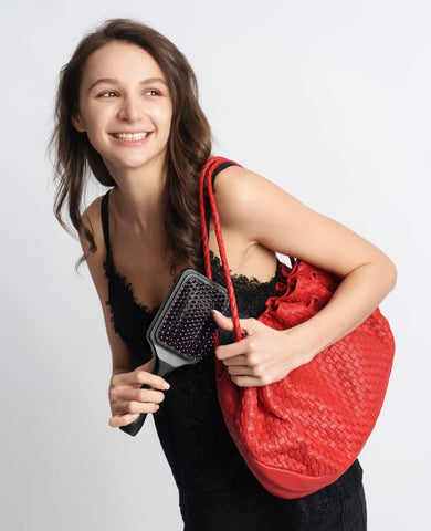 Binocktails Bev-Brush fits in a handbag for discreet refreshments