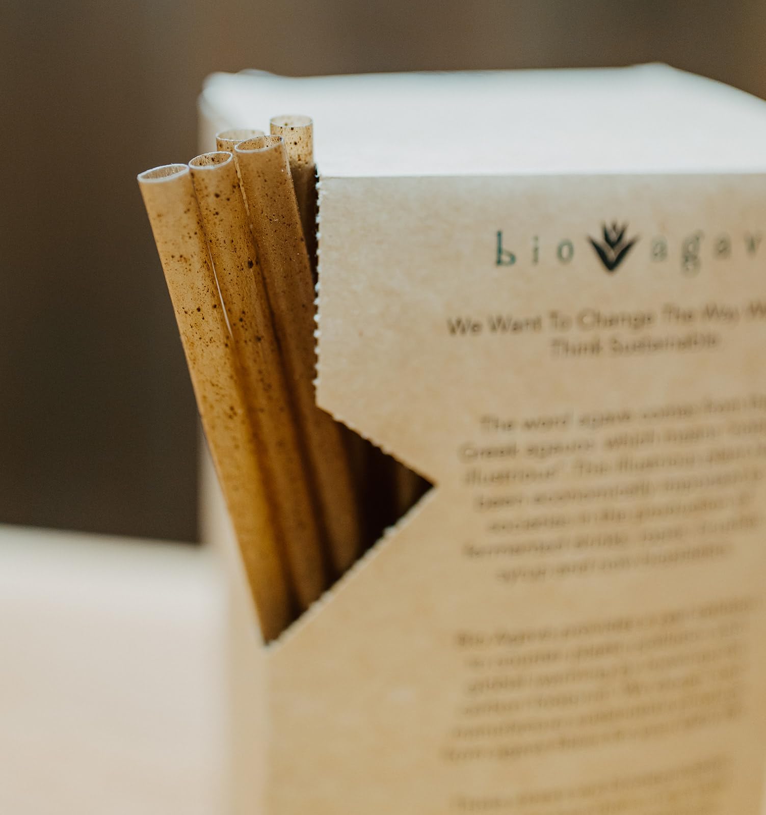 BIO AGAVE straws in glass for versatile sipping.