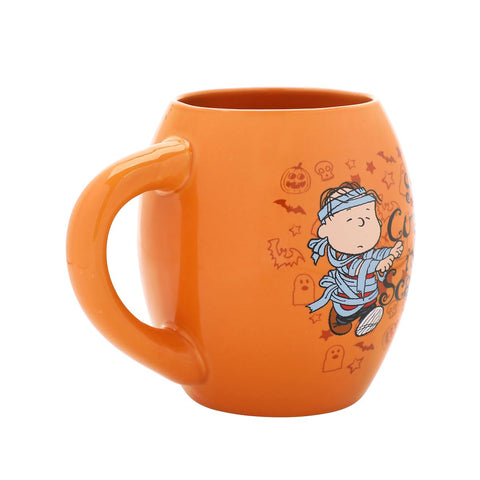 Bioworld Peanuts mug features Snoopy and Woodstock as mummies, adding playful desk-side charm.