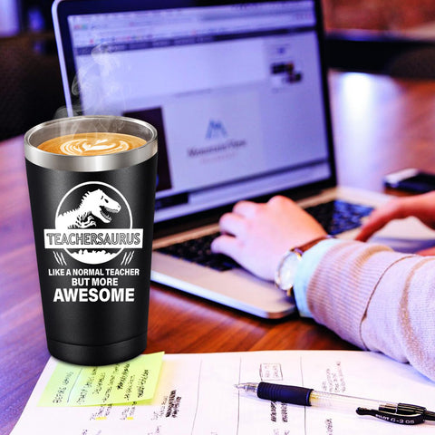 BIRGILT Teachersaurus tumbler on desk with notebook for daily study