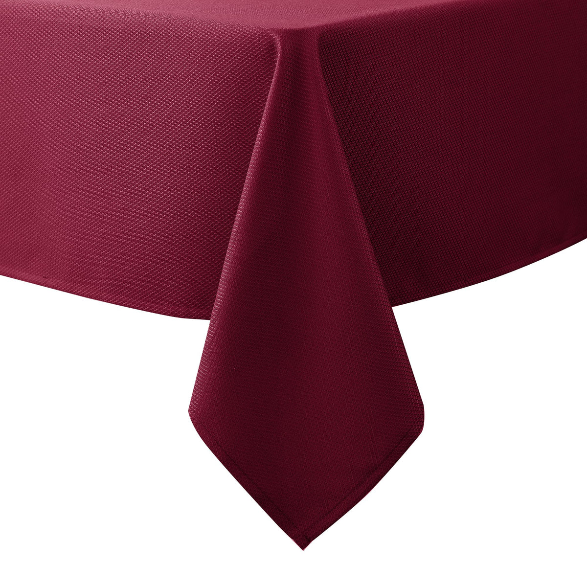 Biscaynebay burgundy textured tablecloth 52x70 on a formal dining setup, adding refined ambiance.