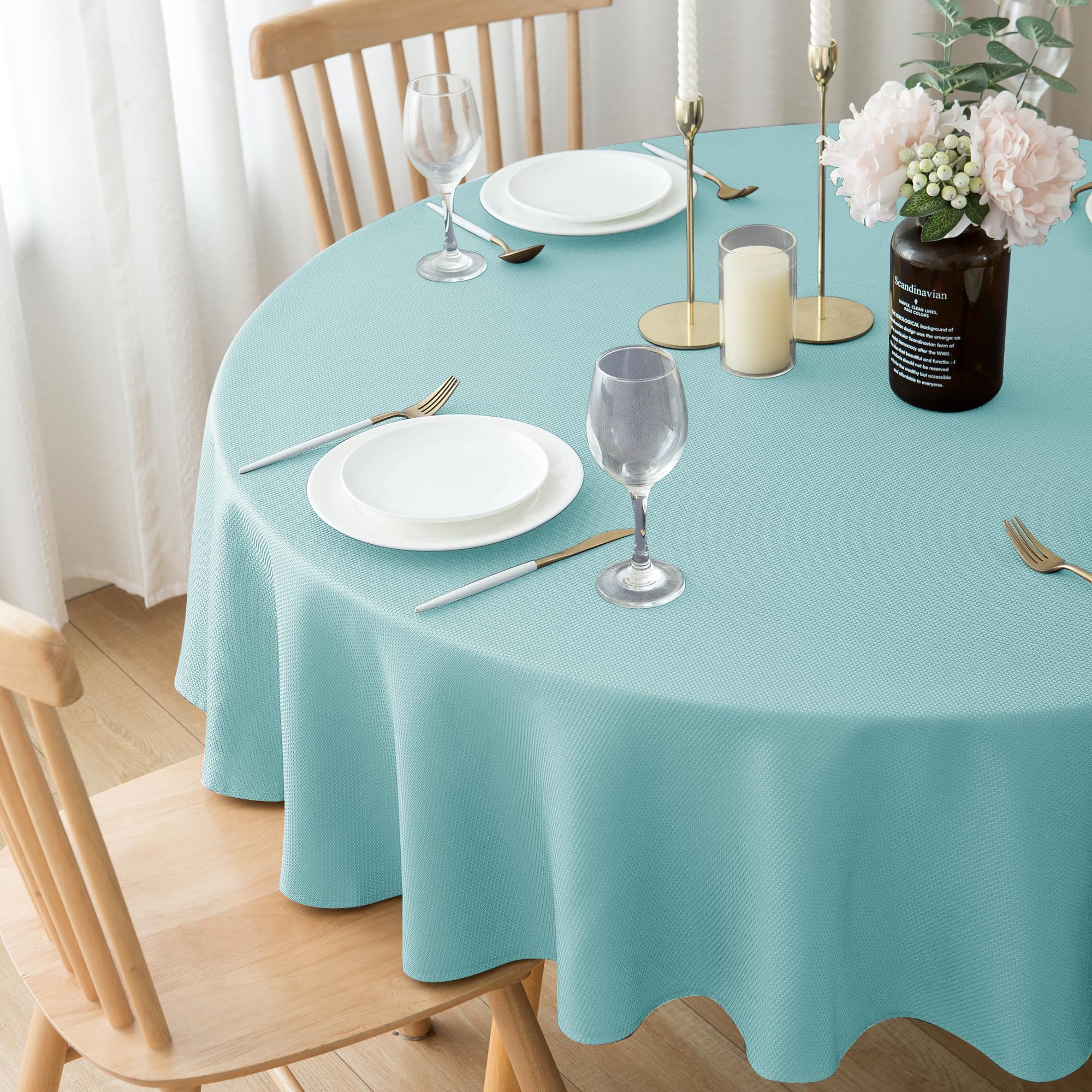 Biscaynebay tablecloth set on a round table for outdoor dining ambiance