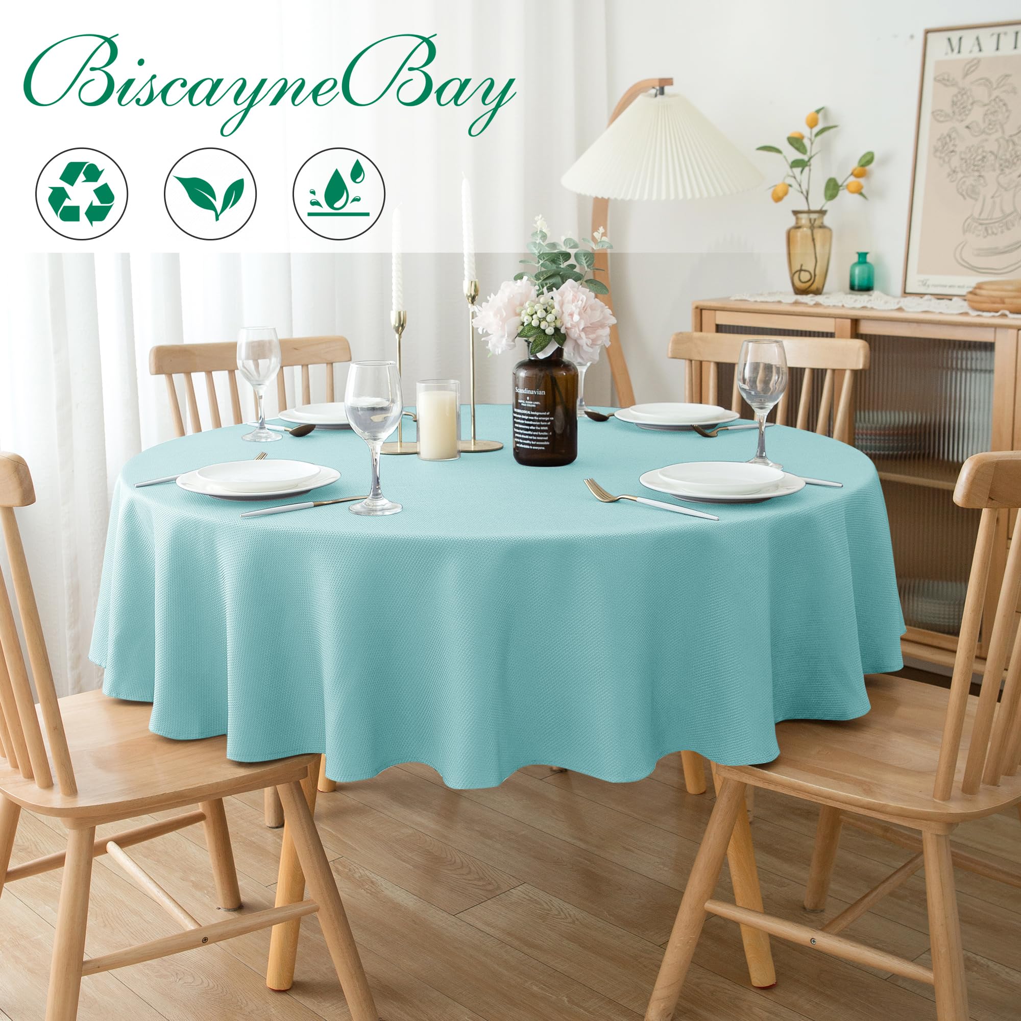 Biscaynebay round tablecloth in Auqa Blue demonstrates water-resistant surface for spills
