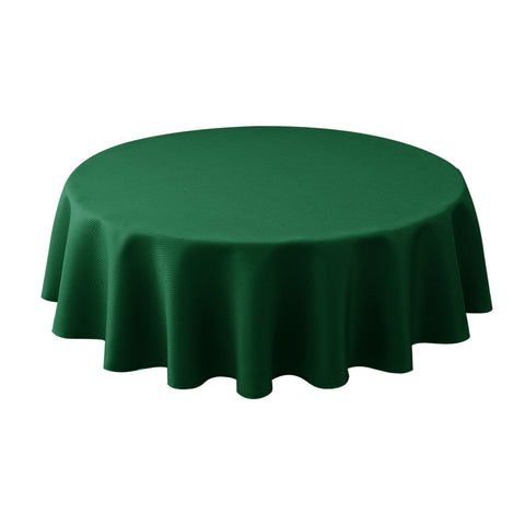 Biscaynebay hunter green round tablecloth draped for an elegant dining setting