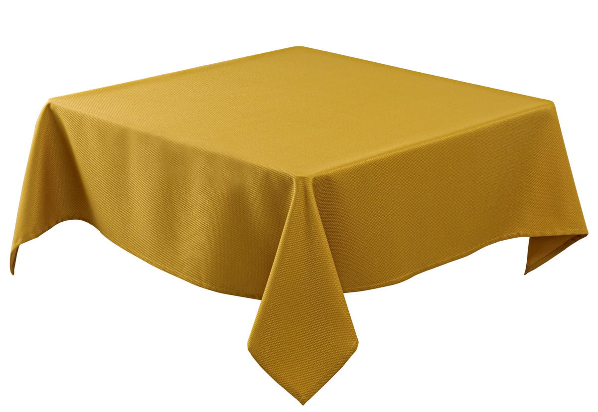 Biscaynebay textured gold tablecloth flatlay showcases luxurious fabric and color.