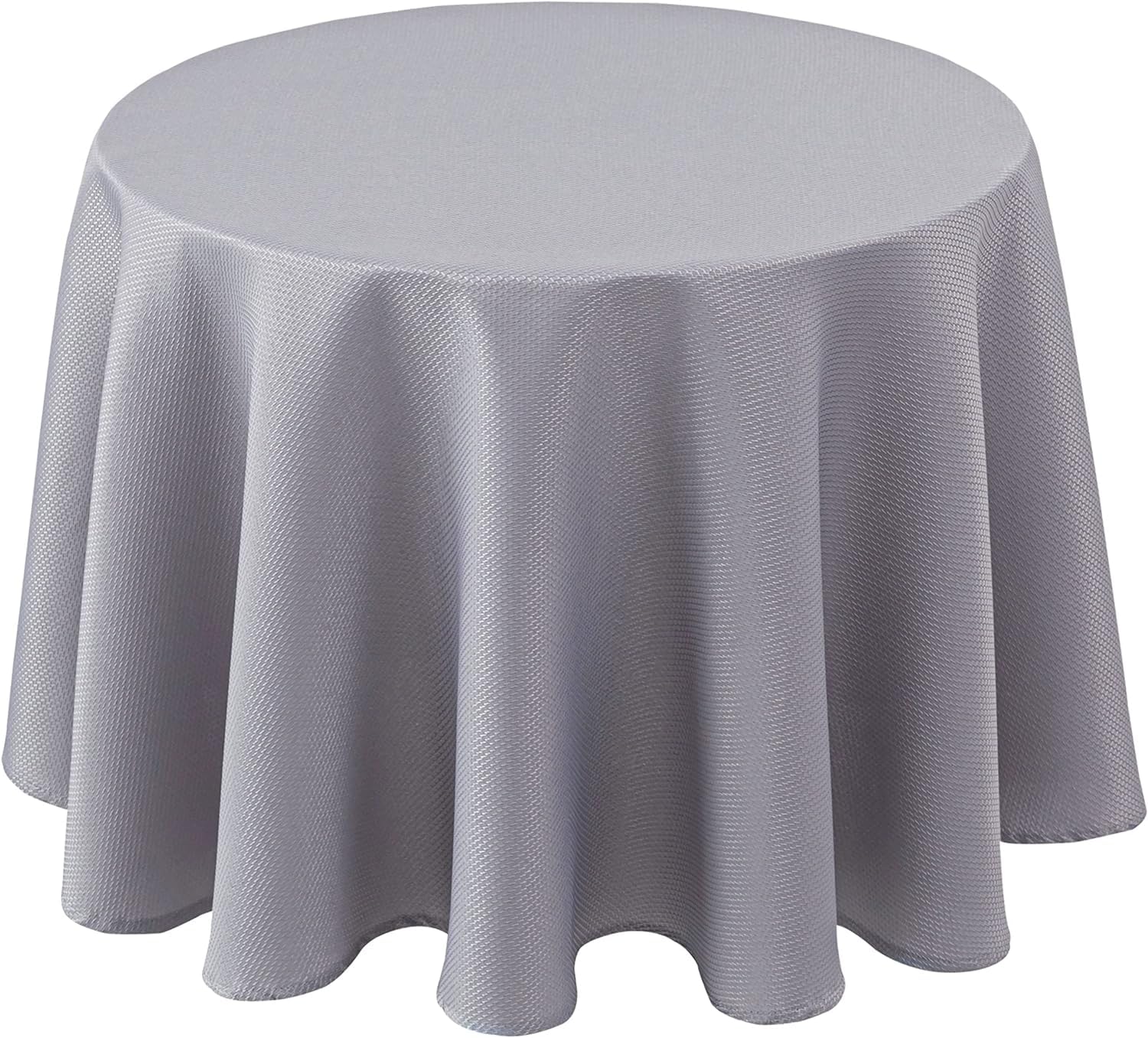 Biscaynebay textured round tablecloth in silver grey draped over a dining table
