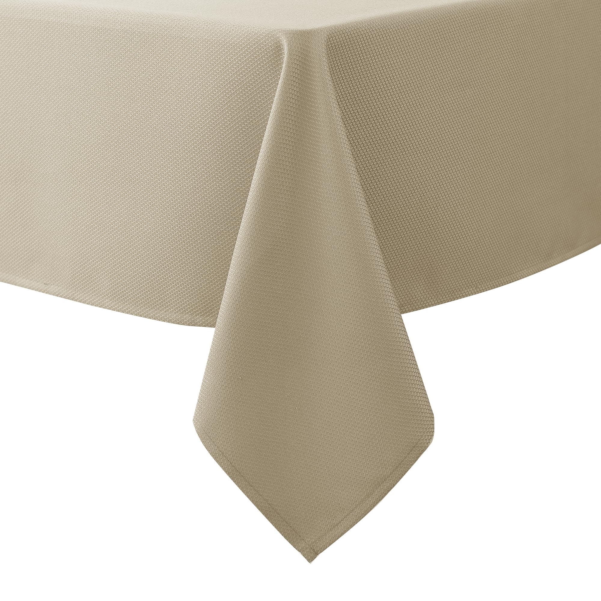 Biscaynebay textured tablecloth on a dining table with elegant drape