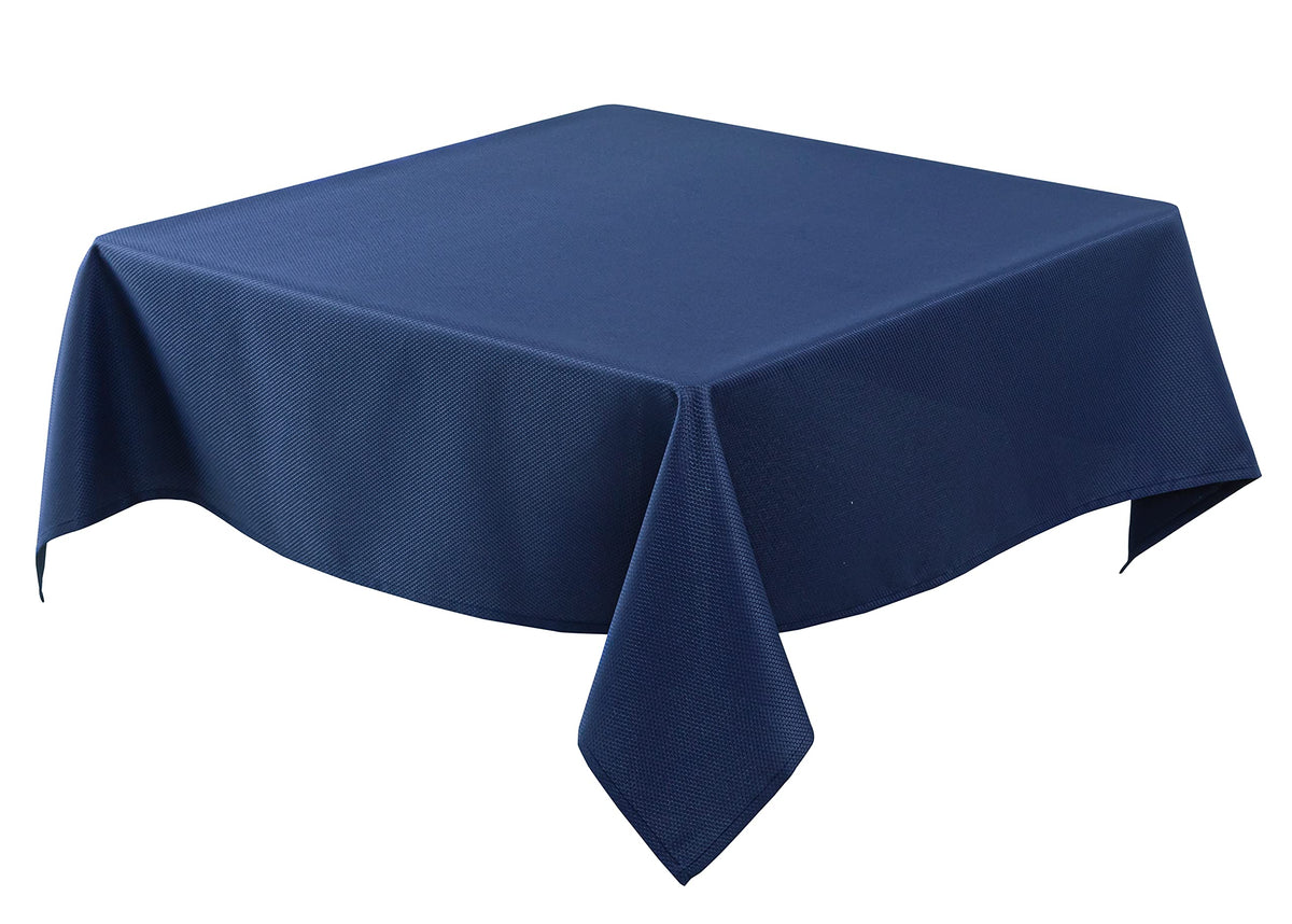 Biscaynebay textured navy tablecloth with premium drape on a dining setup