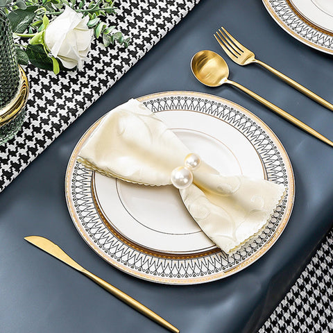 Bituinra gold napkin ring on table setting for elegant dining