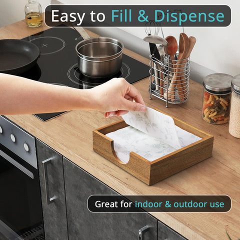 Bivvclaz Acacia wood napkin holder on dining table, adds natural warmth and tabletop style.