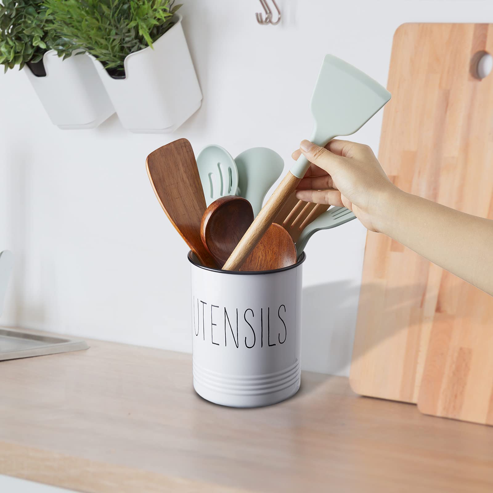 Bivvclaz holder with spoons and tools in use on kitchen counter