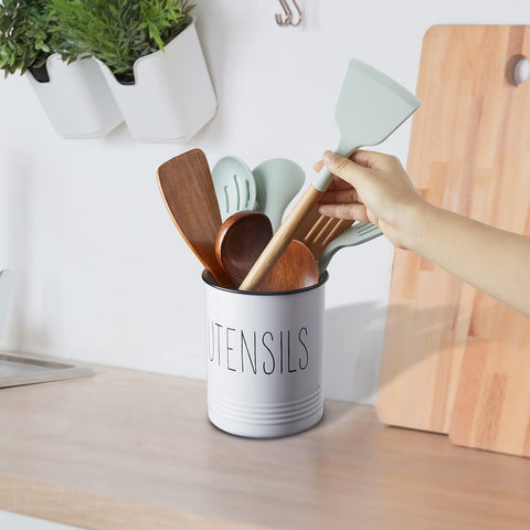 Bivvclaz holder with spoons and tools in use on kitchen counter