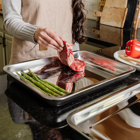 Blazin' Grill weighted trays with handles for portability.