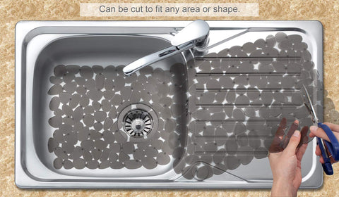 Bligli mat can be cut to fit around a drain stopper.