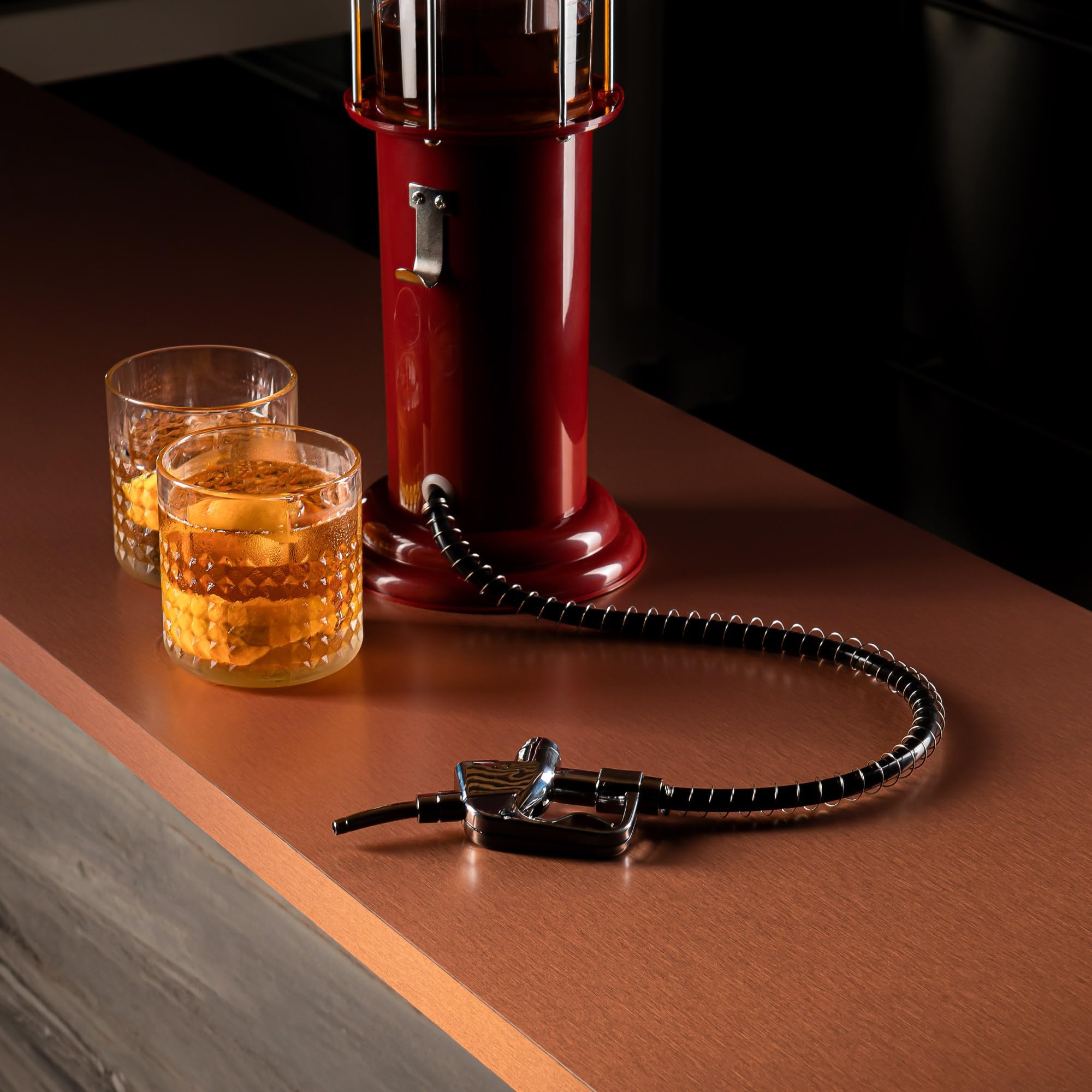 Push-down pump delivers smooth, controlled pours