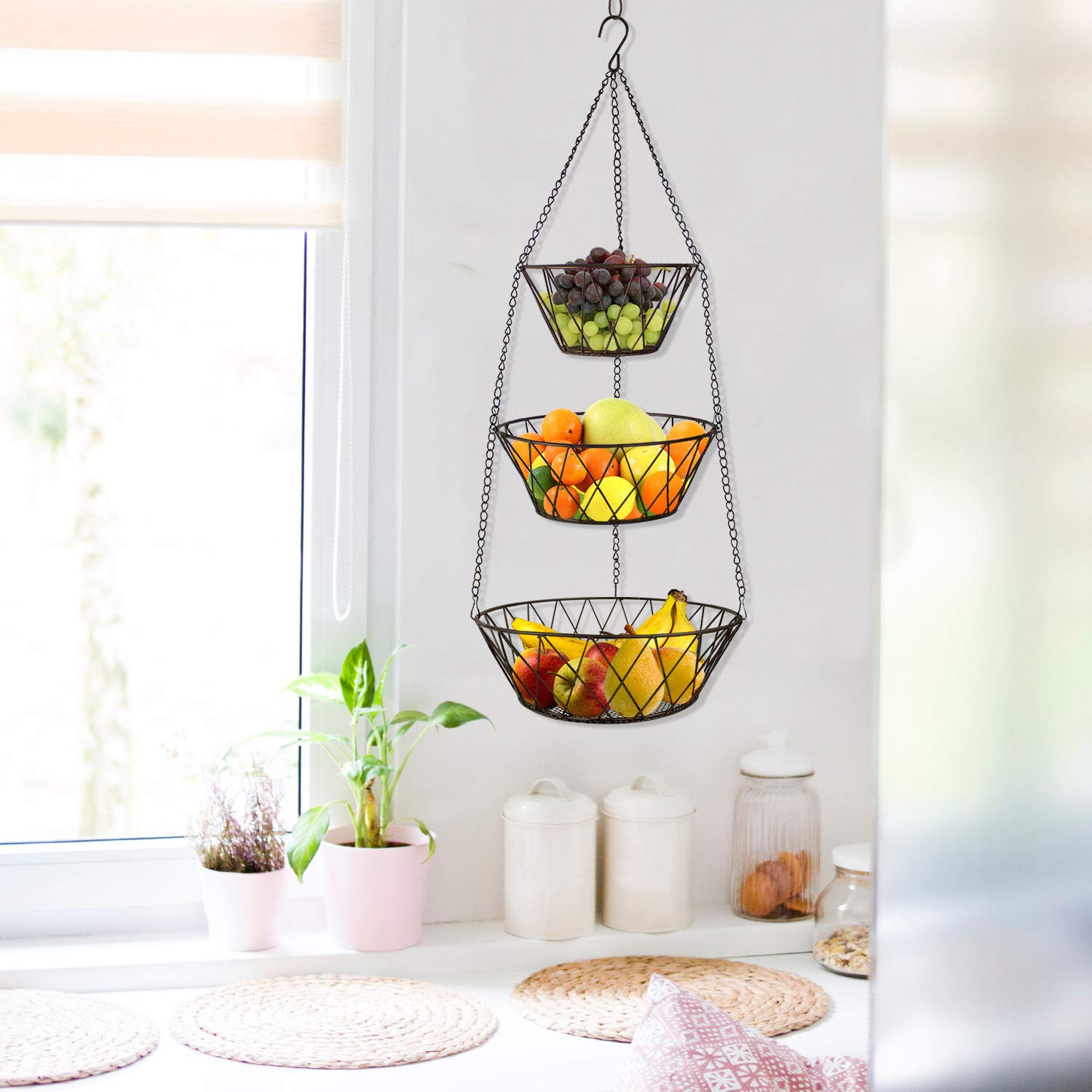 Blue Donuts three-tier fruit display for pantry organization and easy access.