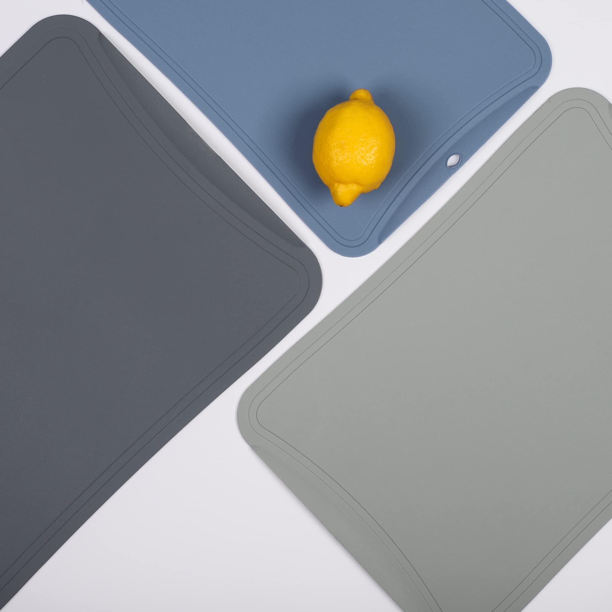 Blue Ginkgo kitchen scene shows multiple mats ready for different ingredients.