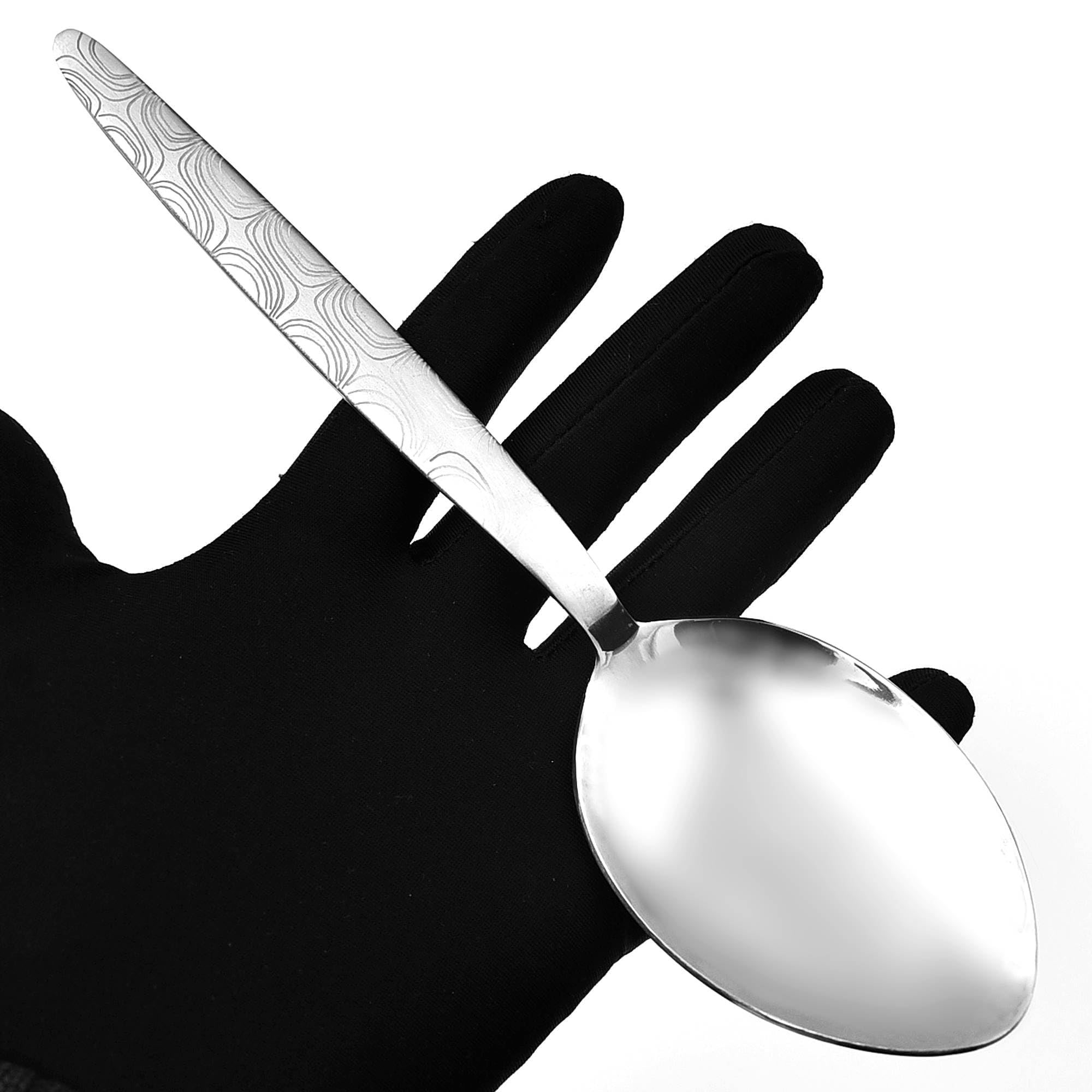 Brushed nickel handle on BNAZIND Kunz spoon for balanced control and comfort.